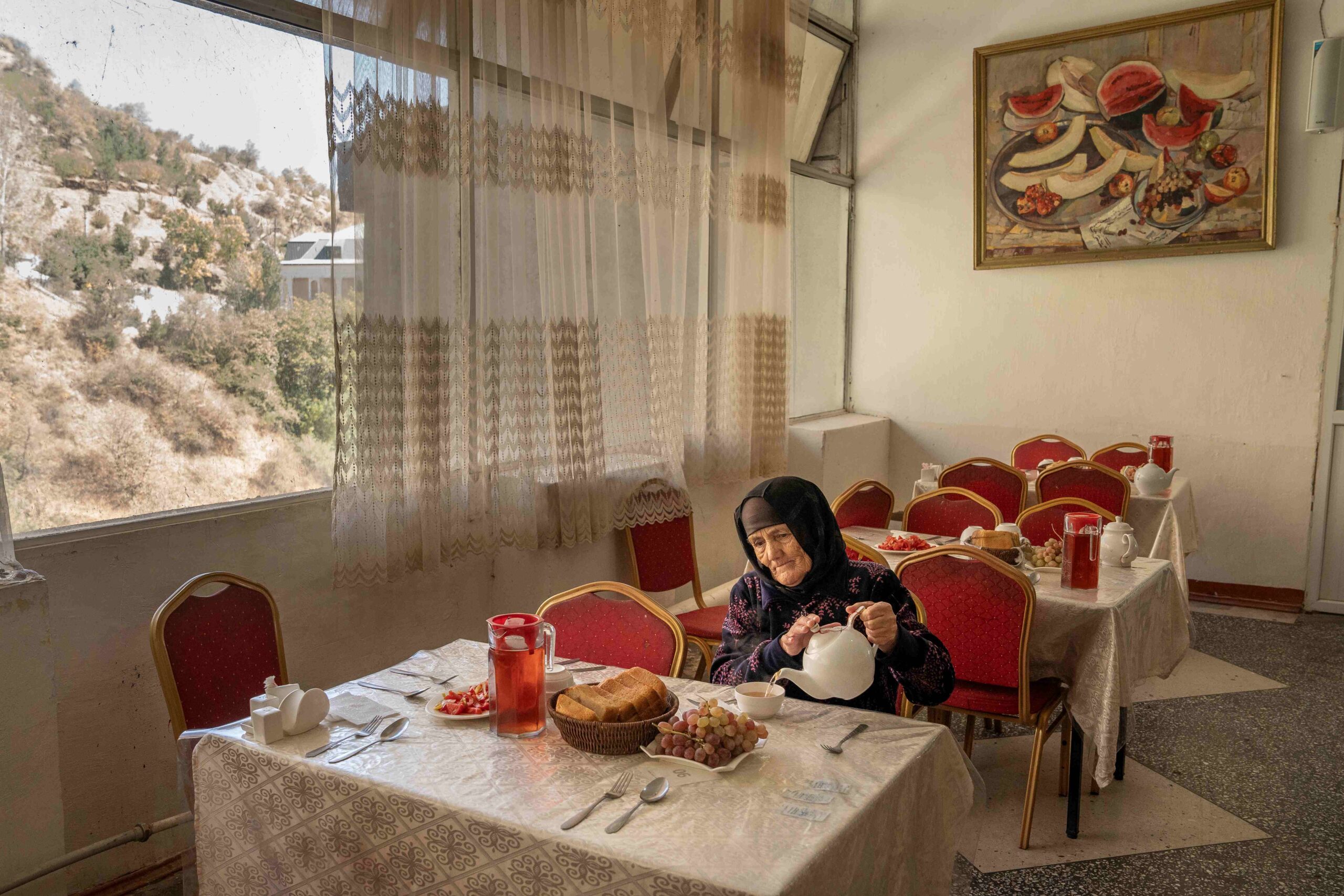 _1_Overall Winner_Jo Kearney_A Woman Eats in the Canteen of the Soviet-era Sanatorium_Hi Res